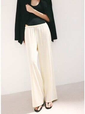 Cream Wide-Leg Drawstring Pants.